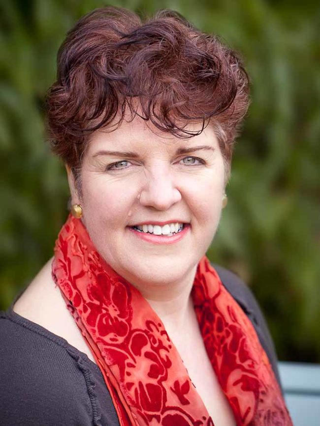 Portrait of woman with red scarf