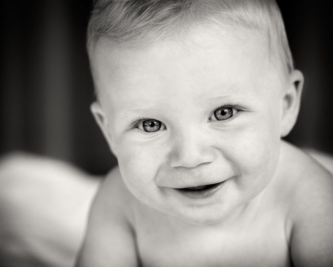 Smiling baby in black and white