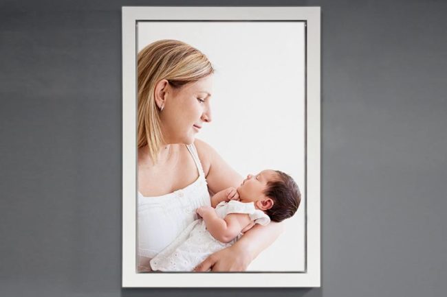 Framed canvas with newborn mother and baby