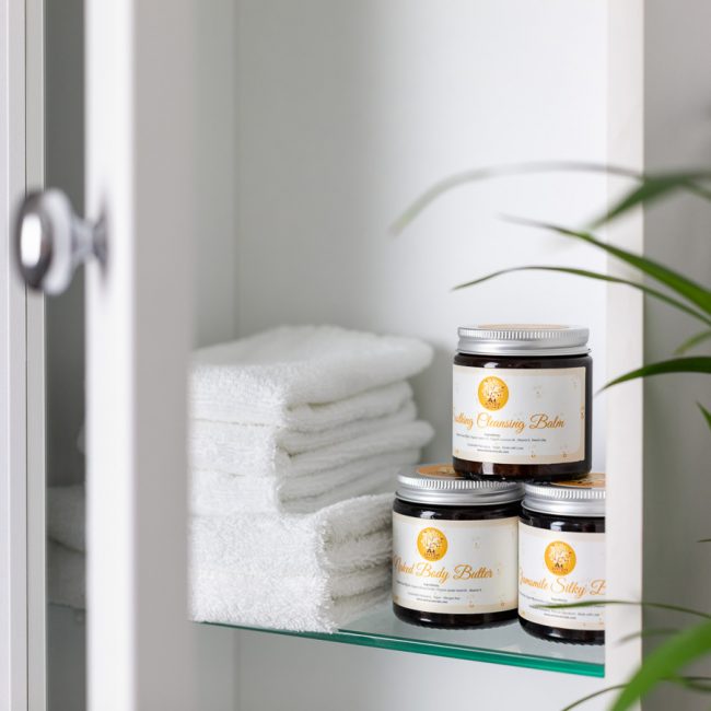 Natural body butter in bathroom cabinet